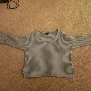 light blue sweater